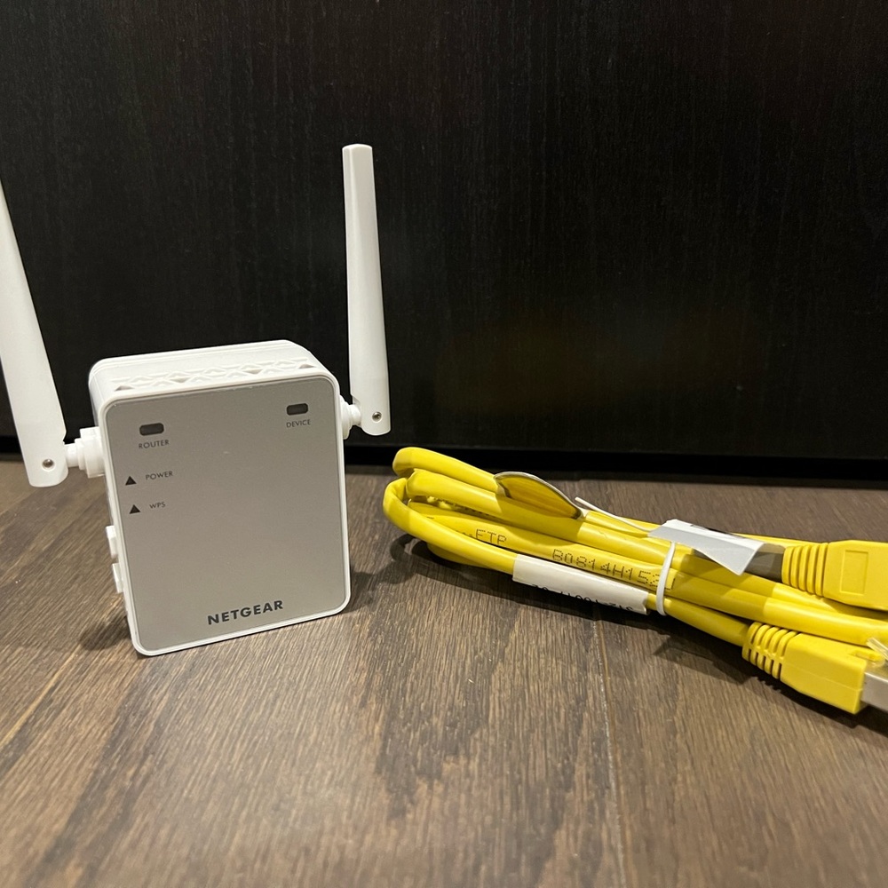 Netgear N300 WiFi Range Extender Model EX2700 with Ethernet Cable
